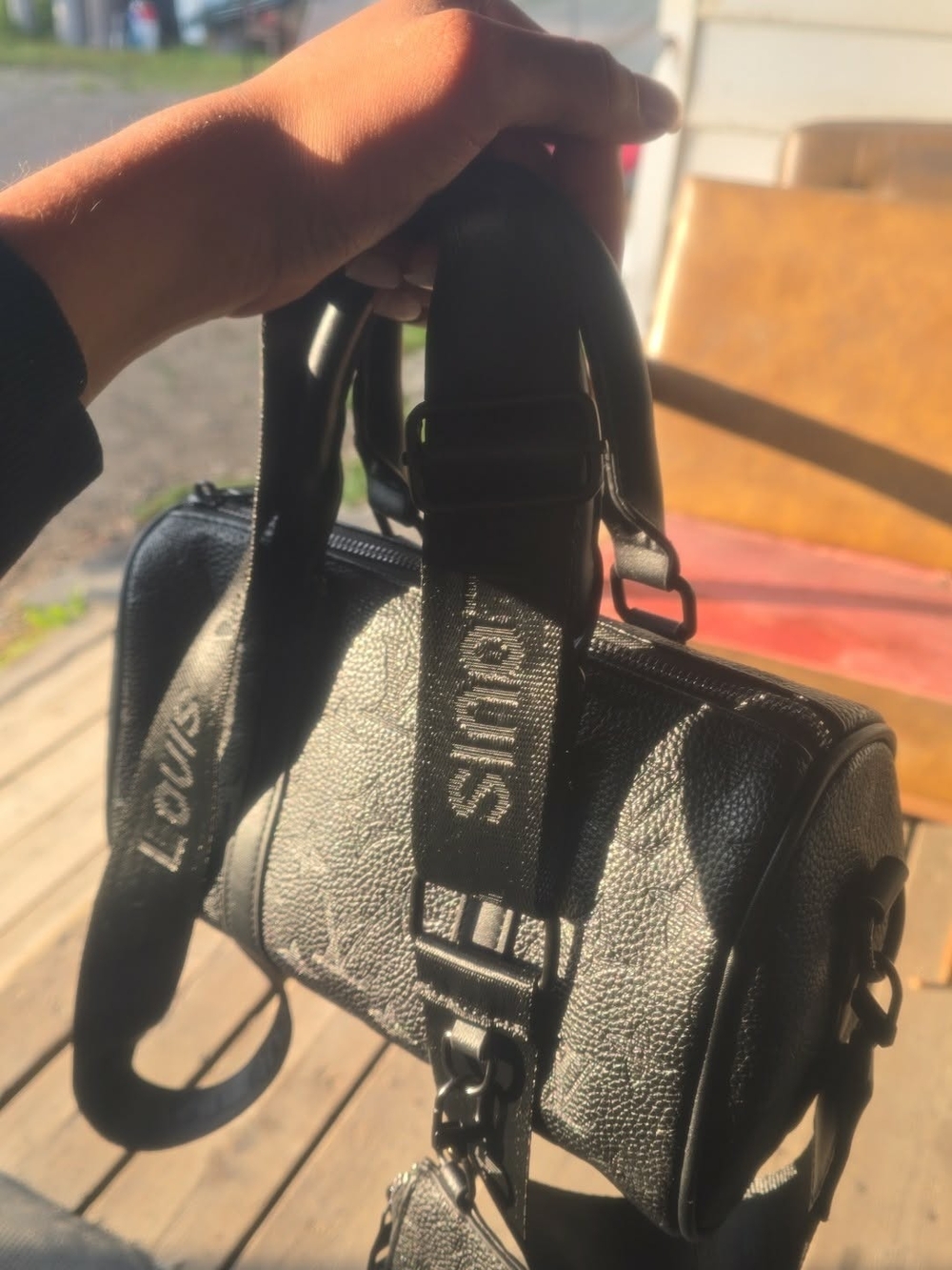 Louis Vuitton Black Leather Barrel Bag with Branded Strap